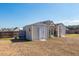 Backyard with a shed and greenhouse at 121 Lakelyn Rd, Moncks Corner, SC 29461