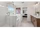 Modern bathroom with a glass-enclosed shower, soaking tub, and double vanity sinks at 121 Palfrey Dr, Ridgeville, SC 29472