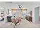 Comfortable bonus room with soft seating, large windows, and a ceiling fan at 121 Palfrey Dr, Ridgeville, SC 29472