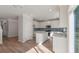 Bright kitchen with stainless steel appliances, white cabinetry, and center island at 121 Palfrey Dr, Ridgeville, SC 29472