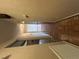 Hallway featuring parquet floors and neutral wall paint leading to a door at the end of the hall at 125 Three Wood Ln, Summerville, SC 29483