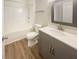 Bathroom with modern vanity, gray cabinets, and tub-shower combination for a luxurious feel at 1300 Park West Blvd # 420, Mount Pleasant, SC 29466