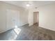 Spacious bedroom features soft carpet, ceiling fan, and large closet doors providing ample storage at 1300 Park West Blvd # 420, Mount Pleasant, SC 29466
