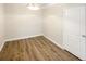 Well-lit dining area features modern light fixture, wood flooring, and convenient door access at 1300 Park West Blvd # 420, Mount Pleasant, SC 29466
