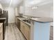 Bright kitchen featuring modern appliances and a breakfast bar perfect for casual dining and entertaining at 1300 Park West Blvd # 420, Mount Pleasant, SC 29466