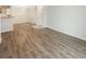 Bright living room showcasing wood flooring and neutral paint, creating a modern, spacious feel at 1300 Park West Blvd # 420, Mount Pleasant, SC 29466