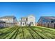Large backyard featuring lush green grass and privacy fence, creating an ideal outdoor space at 1305 Discovery Dr, Ladson, SC 29456