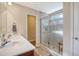 Elegant bathroom with a double sink vanity and a glass-enclosed shower with a bench at 1305 Discovery Dr, Ladson, SC 29456