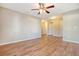 Spacious bedroom with neutral walls, wood-look floors, and ceiling fan at 1305 Discovery Dr, Ladson, SC 29456