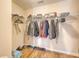 Functional walk-in closet with shelving and hanging rods for optimal storage solutions at 1305 Discovery Dr, Ladson, SC 29456