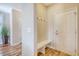 Welcoming entryway featuring a built-in bench, coat hooks, and stylish wood-look flooring at 1305 Discovery Dr, Ladson, SC 29456