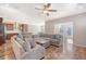 Open-concept living room and kitchen area, perfect for entertaining and Gathering gatherings at 1305 Discovery Dr, Ladson, SC 29456