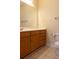 Well-lit bathroom with cabinets, sink, and toilet at 1310 Basildon Rd # 1310, Mount Pleasant, SC 29466