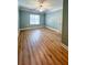 Spacious bedroom features laminated wood flooring, window and crown molding at 1310 Basildon Rd # 1310, Mount Pleasant, SC 29466