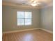 Cozy bedroom with wood floors and a ceiling fan at 1310 Basildon Rd # 1310, Mount Pleasant, SC 29466