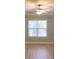 Bright bedroom with wood flooring and large window at 1310 Basildon Rd # 1310, Mount Pleasant, SC 29466
