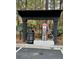 Car cleaning station featuring vacuum and trash can under pergola at 1310 Basildon Rd # 1310, Mount Pleasant, SC 29466