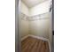Walk-in closet with laminated flooring and wire shelving at 1310 Basildon Rd # 1310, Mount Pleasant, SC 29466