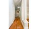 View of hallway with wood floors leading to bathroom at 1310 Basildon Rd # 1310, Mount Pleasant, SC 29466