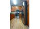 Contemporary kitchen featuring stainless steel appliances, wood cabinets, and hardwood floors at 1310 Basildon Rd # 1310, Mount Pleasant, SC 29466