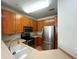 Modern kitchen with stainless steel appliances, wood cabinets, and plenty of counter space at 1310 Basildon Rd # 1310, Mount Pleasant, SC 29466