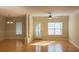 Bright living room featuring hardwood floors, elegant columns, and abundant natural light at 1310 Basildon Rd # 1310, Mount Pleasant, SC 29466