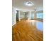 Spacious living room showcasing hardwood floors, natural light, and a ceiling fan at 1310 Basildon Rd # 1310, Mount Pleasant, SC 29466