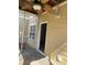 Screened porch with wooden deck, ceiling fan, and door to interior at 1310 Basildon Rd # 1310, Mount Pleasant, SC 29466