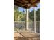 Screened-in porch featuring wooded views and plenty of natural light at 1310 Basildon Rd # 1310, Mount Pleasant, SC 29466