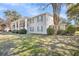 Charming condo showcasing meticulous landscaping and inviting exterior features at 1402 Camp Rd # 8B, Charleston, SC 29412