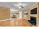 Bright living room featuring a cozy fireplace at 1402 Camp Rd # 8B, Charleston, SC 29412