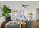 Cozy living room showcasing a fireplace, natural lighting, and comfortable furniture arrangements at 1589 Kentwood Cir, Charleston, SC 29412