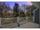 Balcony with white railing and view of the trees at 1714 Greystone Blvd # 47, Mount Pleasant, SC 29464