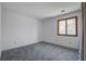 Cozy bedroom with plush carpeting and a window offering natural light at 1714 Greystone Blvd # 47, Mount Pleasant, SC 29464