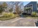 Exterior showcasing the well-maintained landscaping and architectural style at 1714 Greystone Blvd # 47, Mount Pleasant, SC 29464