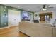 Spacious living room featuring hardwood floors, a ceiling fan, and comfortable seating at 1758 Mendel Rivers Rd, Saint Stephen, SC 29479