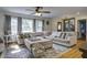 Comfortable living room featuring a large sectional sofa and views to other rooms at 1758 Mendel Rivers Rd, Saint Stephen, SC 29479