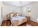 Well-lit bedroom with natural accents, bedside tables, and neutral bedding create a serene, inviting space at 18 Sothel Ave, Charleston, SC 29407