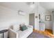 Sitting area with white walls, loveseat, and accent pillows at 18 Sothel Ave, Charleston, SC 29407