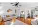 Cozy living room with hardwood floors, neutral furniture, and stylish decor accents at 18 Sothel Ave, Charleston, SC 29407