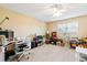 Bright and spacious bedroom with a ceiling fan, suitable for a home office at 1860 Mepkin Rd # H1, Charleston, SC 29407