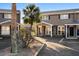 Attractive townhouse with a welcoming entrance, black shutters, and neatly arranged parking area at 1860 Mepkin Rd # H1, Charleston, SC 29407