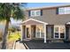 Charming two-story home with brick and siding, featuring a covered entrance and well-maintained landscaping at 1860 Mepkin Rd # H1, Charleston, SC 29407