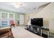 Comfortable living area with sofa, tv, staircase and a bright open space at 1860 Mepkin Rd # H1, Charleston, SC 29407