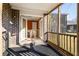 View from a covered patio showing an adjacent dining area and fenced yard at 1860 Mepkin Rd # H1, Charleston, SC 29407