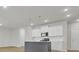 Bright kitchen featuring white cabinets, stainless steel appliances, and a gray island at 2021 Quiet Ibis Rd, Hanahan, SC 29410