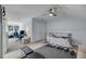Versatile room with a bed, desk, and workout equipment, offering a flexible living space for relaxation and exercise at 2322 Watchtower Ln, Charleston, SC 29414
