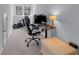 Bedroom features a computer desk and chair for work, with a window providing natural light at 2322 Watchtower Ln, Charleston, SC 29414