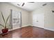 Empty bedroom with hardwood floors, a ceiling fan, and natural light at 240 Gazania Way, Charleston, SC 29414