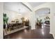 Dining room with a view to the living room and fireplace at 240 Gazania Way, Charleston, SC 29414